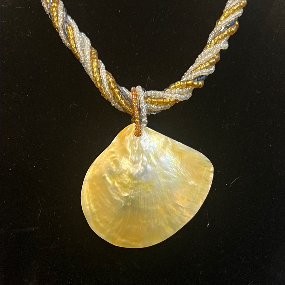 Elegant Gold yellow hue Shell Pendant on a seed bead Necklace